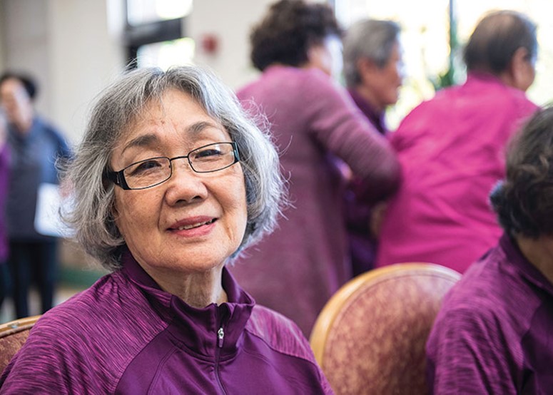 Participants in a Juniper class, smiling woman