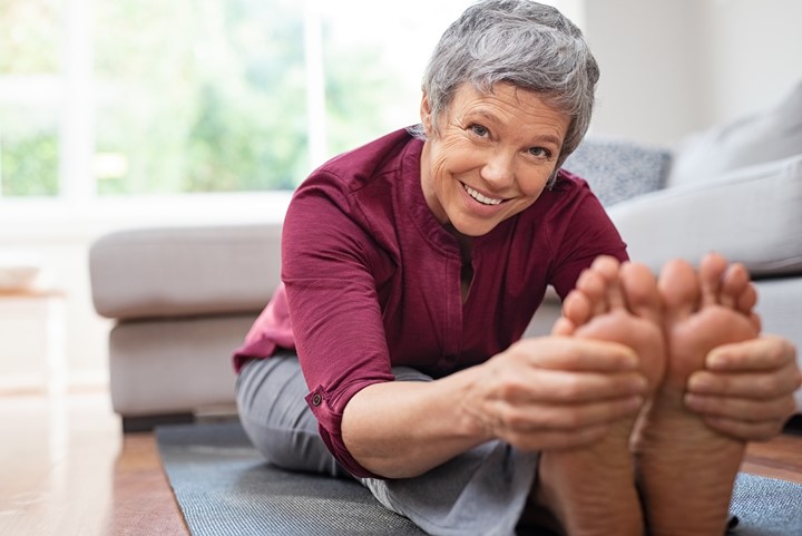 Woman exercising and stretching