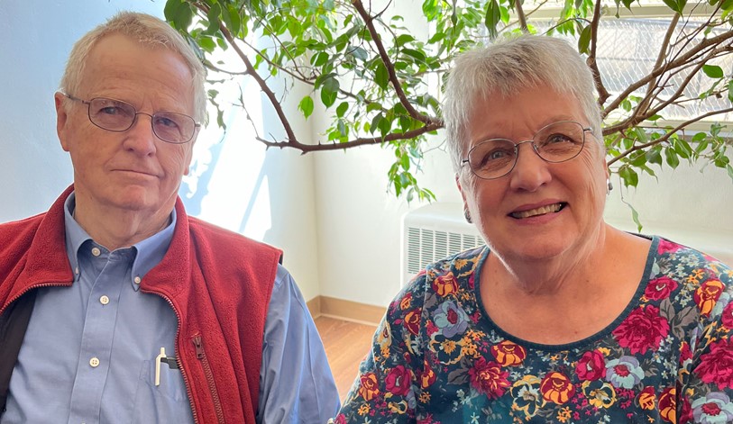 Teresa and her husband smiling