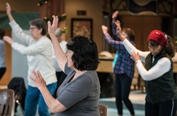 Group setting people doing exercises